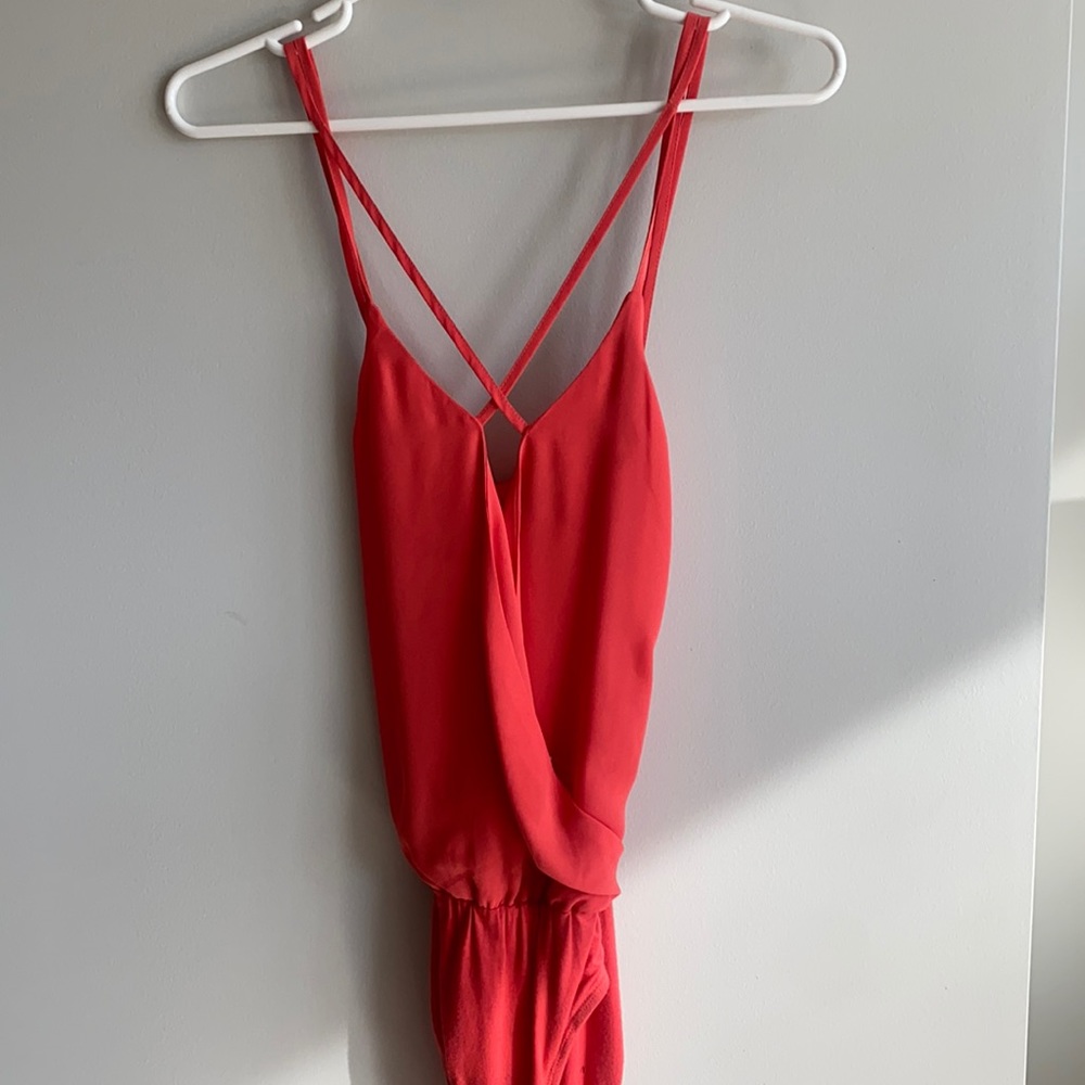 Criss cross coral bodysuit